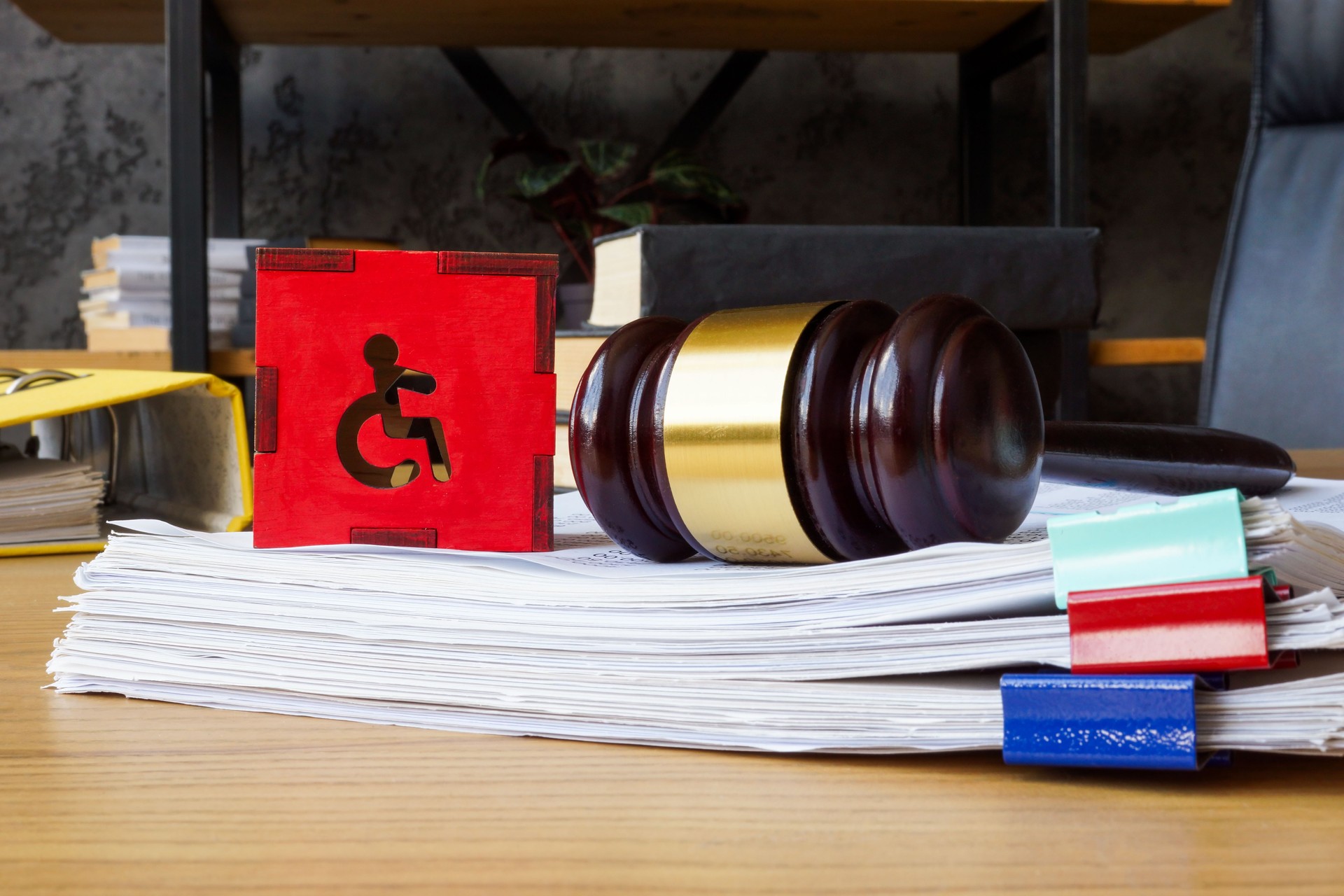 Gavel and disabled person sign, Inclusion and disability rights.